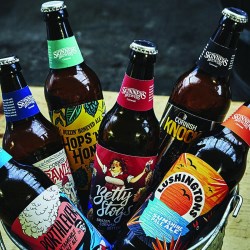 Beatson Clark supplies bottles and crowns for Skinners