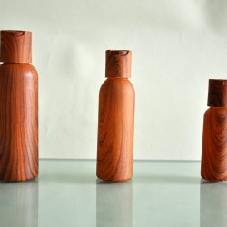CPL Packaging present plastic bottles and caps that look like wood