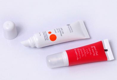 Tube with angled applicator