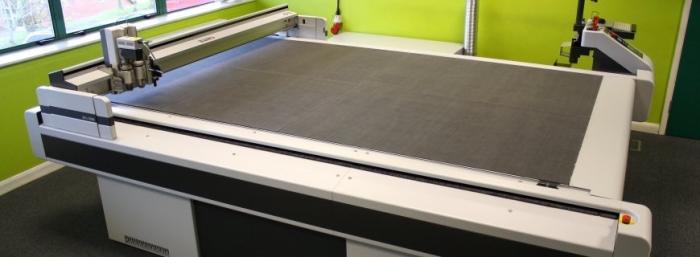 Excitement in the Atlas Packaging design hub as the new Zund G3 plotting table is installed, along with Artios CAD and Cape Pack