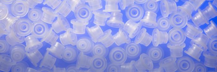 Closures with syringe adapters
