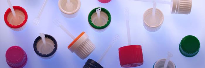 Closures with application spatulas