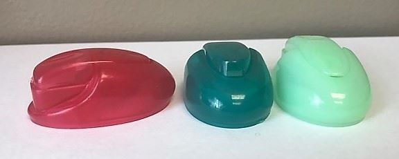 Custom mold - Thumb action dispensing closure