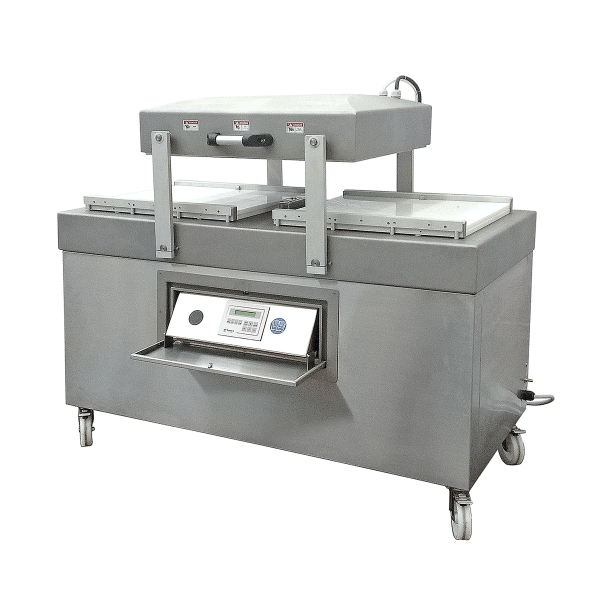 Double vacuum chamber machine