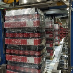 Coca-Cola İçecek joins the palletizing of bottles into carton trays for display