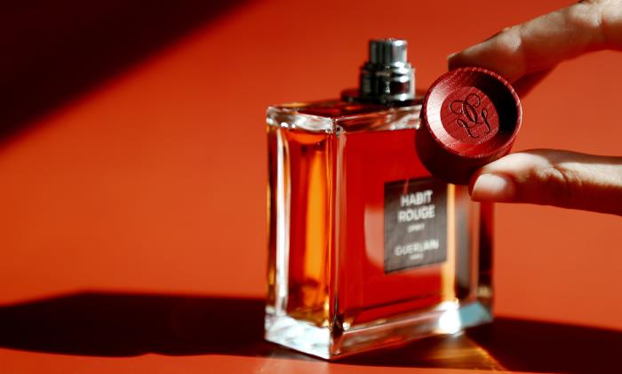 A luxury wood cap for Guerlain’s Habit Rouge Spirit