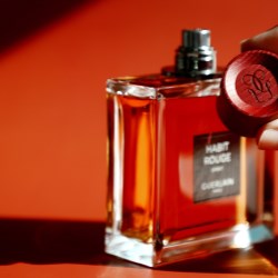 A luxury wood cap for Guerlain’s Habit Rouge Spirit