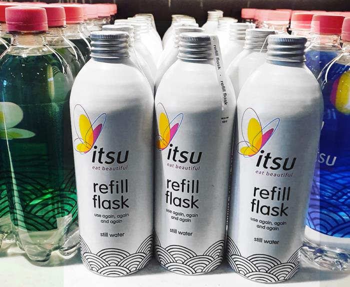 The green message in the aluminium bottle