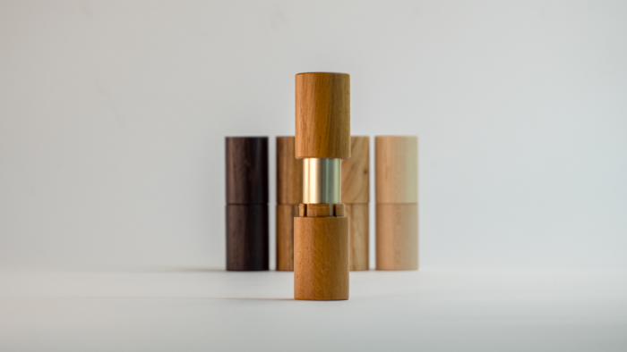 Aptar Beauty & Quadpack Revamp Refillable Lipstick Encased in Wood