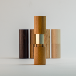 Aptar Beauty & Quadpack Revamp Refillable Lipstick Encased in Wood