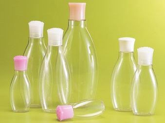 Oval cosmetic bottles with rose shaped cap