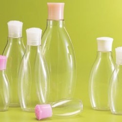 Oval cosmetic bottles with rose shaped cap